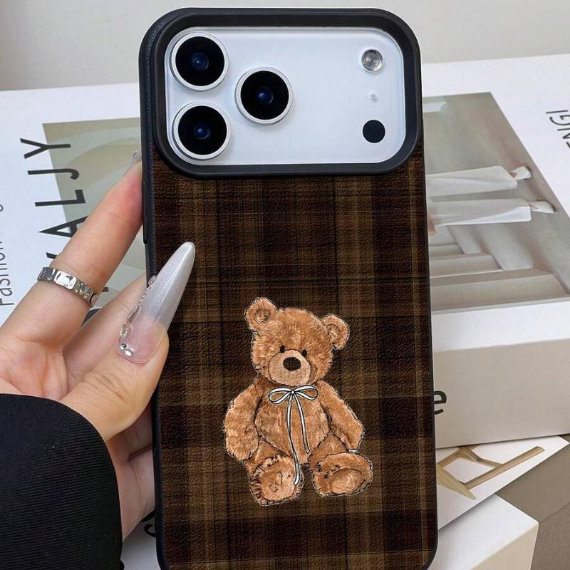 Teddy Bear Phone Case - brown plaid back with embroidered teddy bear, held in hand